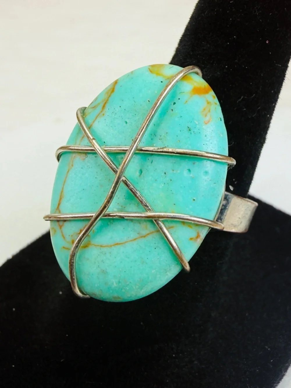 Aged silvertone, wire wrapped blue center size 6 adjustable costume ring